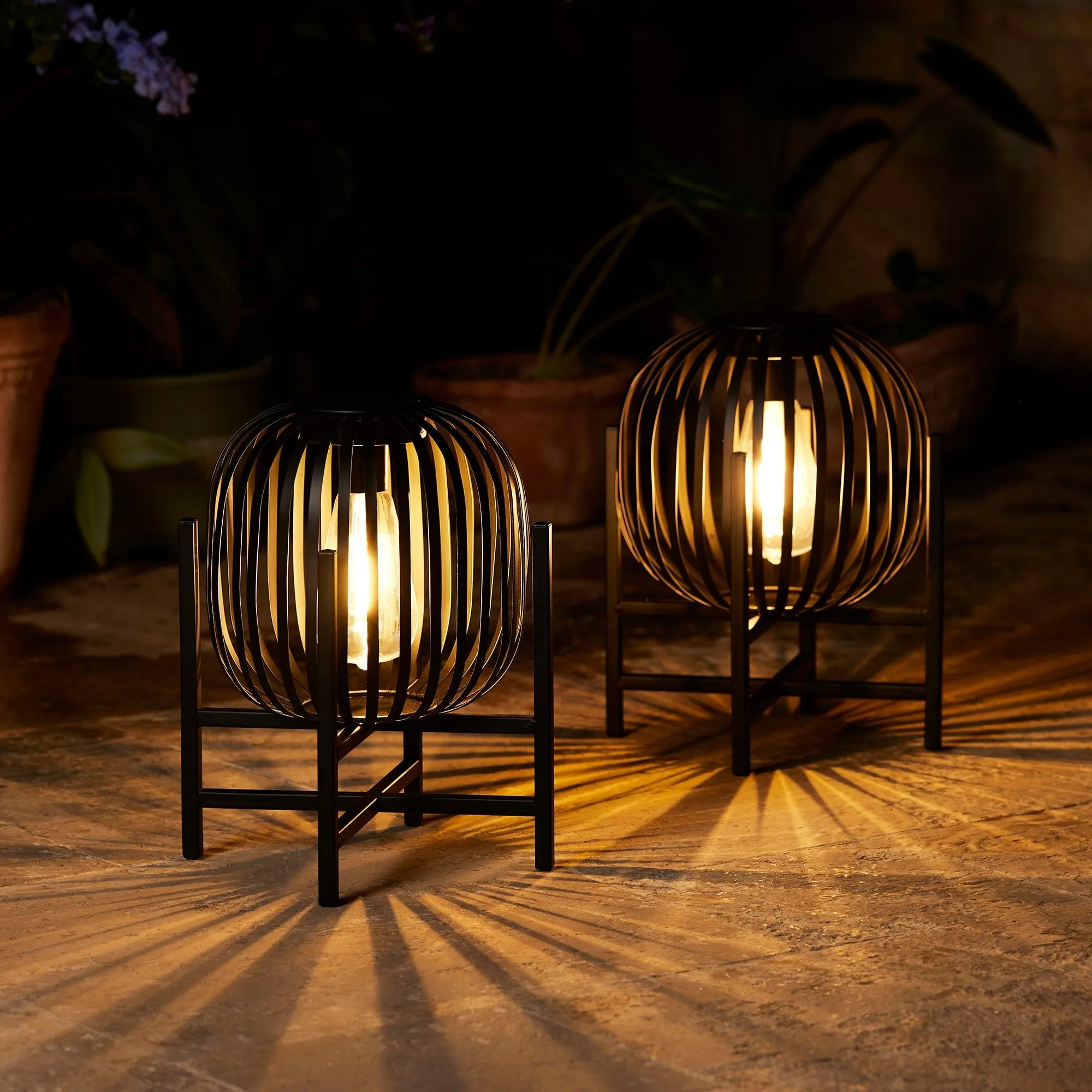 Glitzhome Set of 2 Outdoor Black Metal Striped Solar Lantern Floor Lamp
