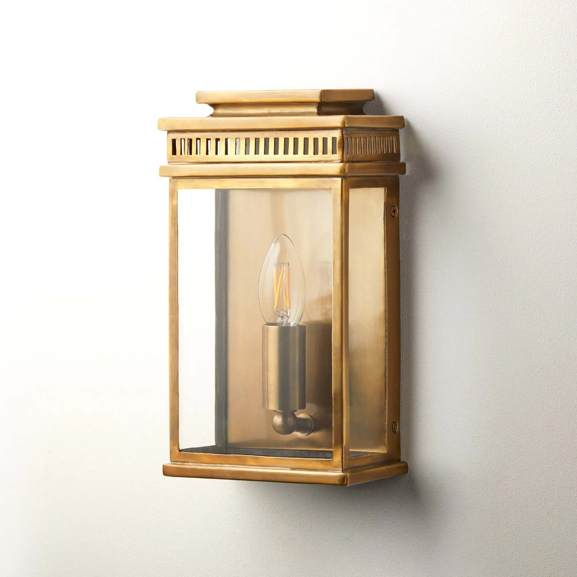 Tenby exterior IP44 wall light in antiqued brass