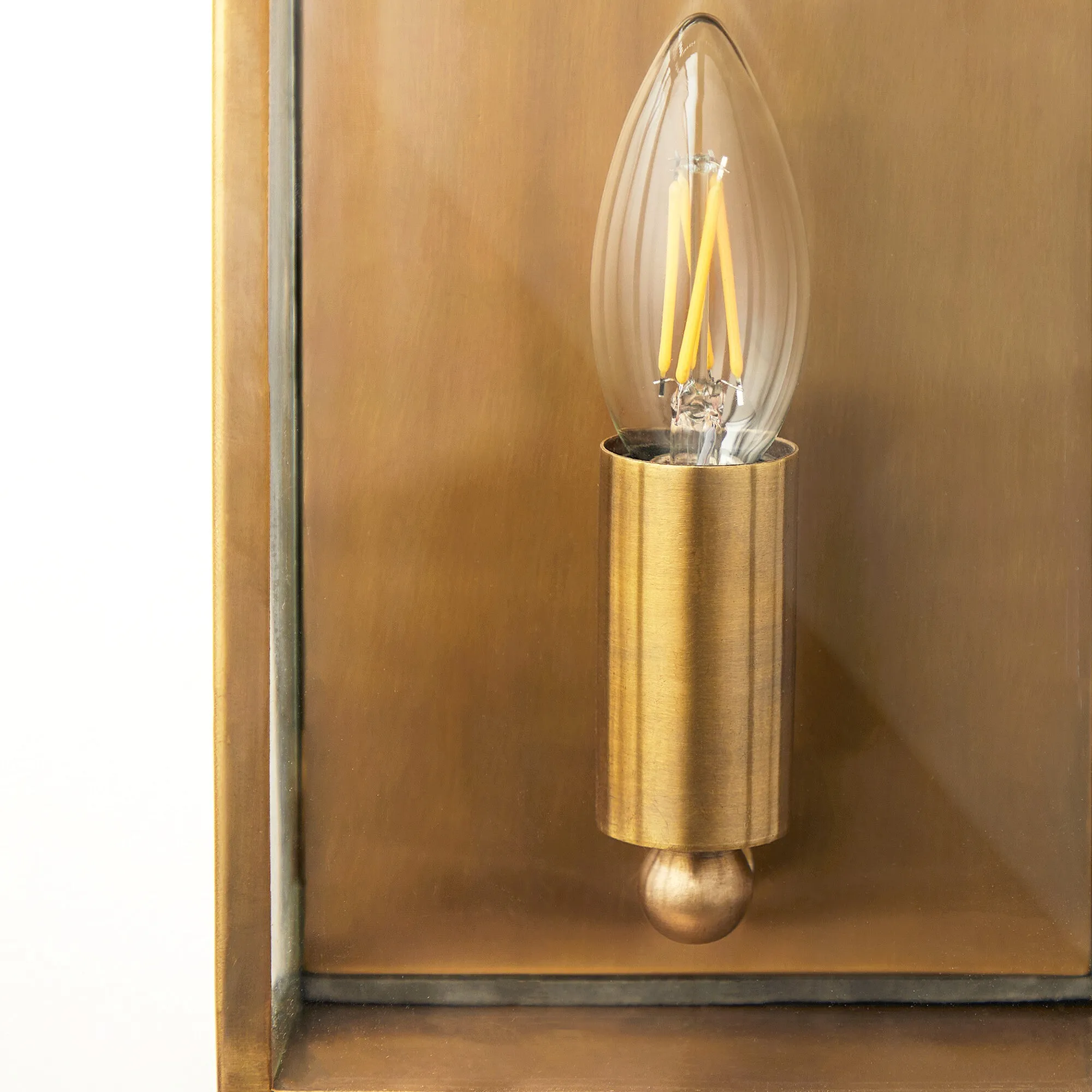 Tenby exterior IP44 wall light in antiqued brass