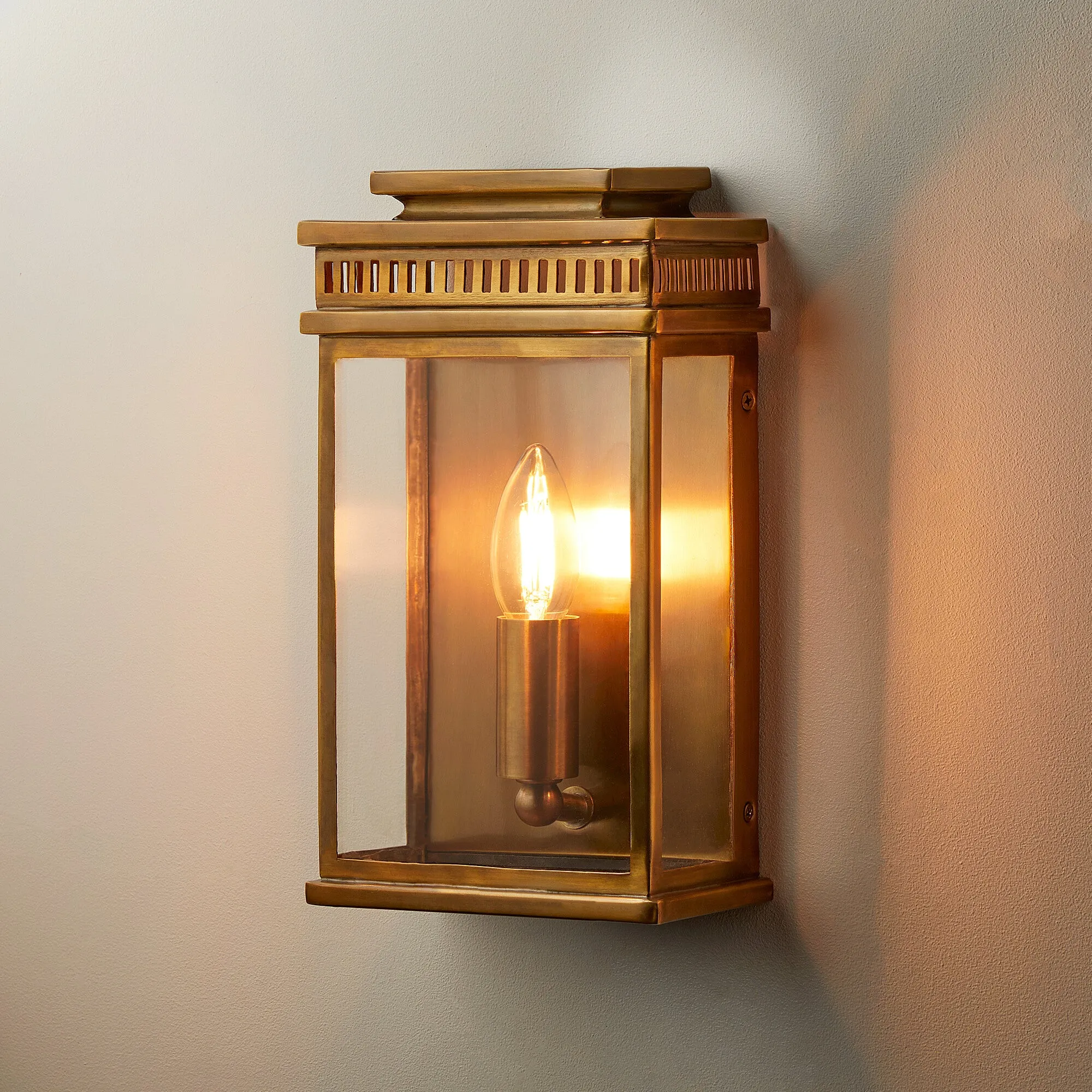 Tenby exterior IP44 wall light in antiqued brass